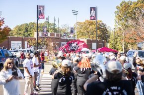 Marching band entering Moretz Stadium