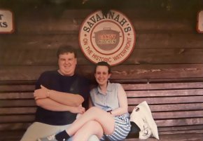 Tyler and Natisha Prince on a bench in Savannah, Georgia