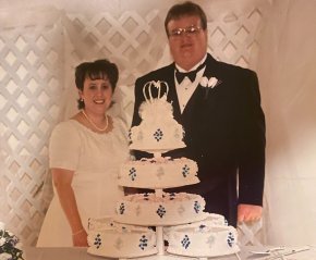 Tyler and Natisha Prince with their wedding cake