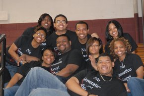 A group of students smile for a photo