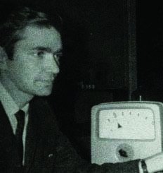 Charles Cooke with lab equipment in 1966