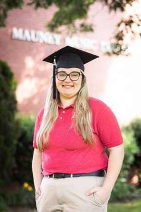 Tiffany Holman stands in front of Mauney Music Building