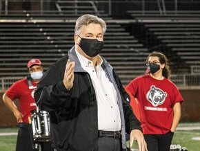 Photo of Neil Underwood in the football stadium.