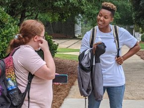 Candice Clark talks with classmate after class