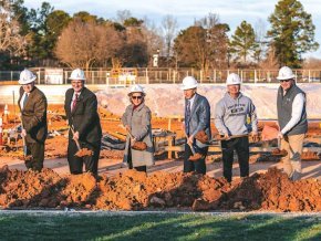 LR alumni and friends break ground with shovels during Moretz Stadium groundbreaking event