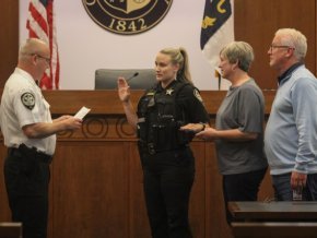 Grayson Cameron being sworn in as a sheriff's deputy