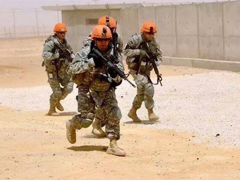 LR student Nikolai Patterson runs through a training exercise in the military.