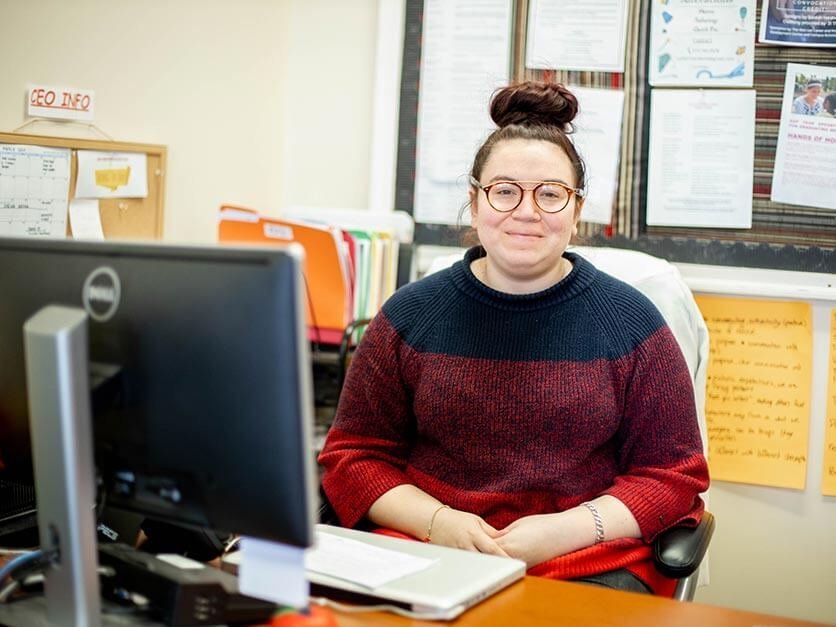 Yasmine Arevalo at her desk in the career center