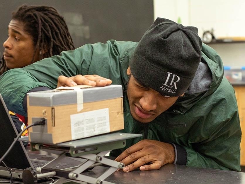 A student works on a research physics project