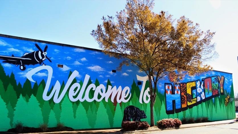 Welcome to Hickory mural text on wall of building